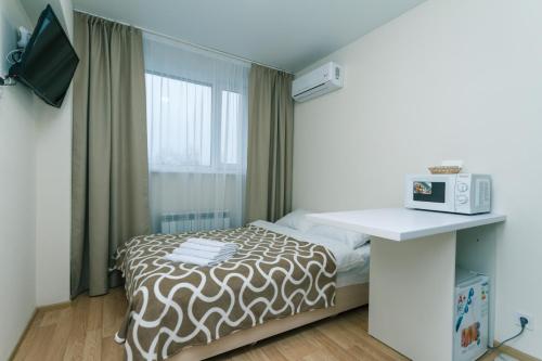 Postel nebo postele na pokoji v ubytování FlatRent SmartHouse