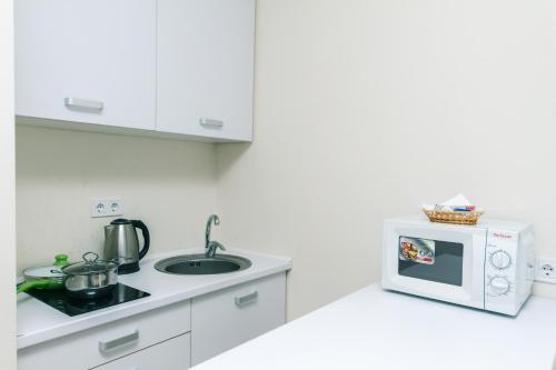 FlatRent SmartHouseにあるキッチンまたは簡易キッチン