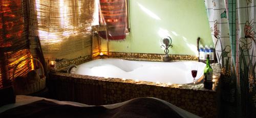 Ванная комната в Hotel Festival Plaza Playas Rosarito