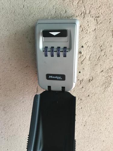 a fax machine sitting on top of a wall at Longhorn Ranch Apartments in Orbost