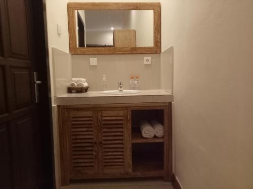 Een badkamer bij Umah Dajane Guest House