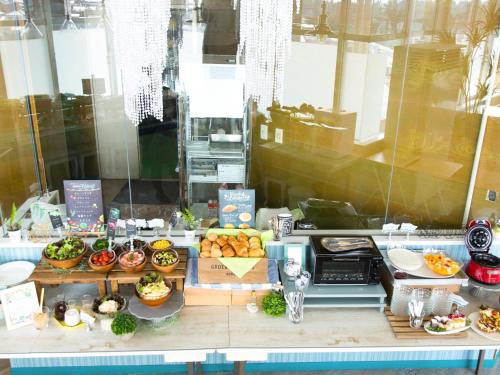 a display of food in a store window at Hotel AreaOne Sakaiminato Marina in Sakaiminato