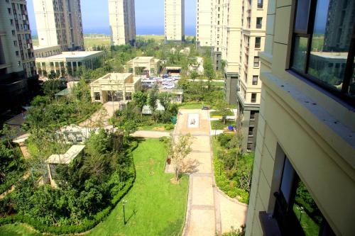 Fotografie z fotogalerie ubytování Sea View Apartment Qingdao North Railway Station Branch v destinaci Xiazangtuan