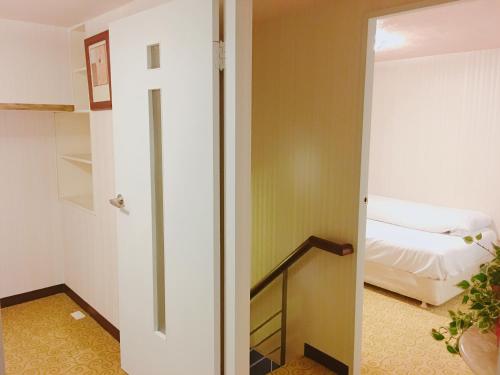 Postel nebo postele na pokoji v ubytování Hi-Star View Hotel