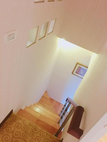 Postel nebo postele na pokoji v ubytování Hi-Star View Hotel