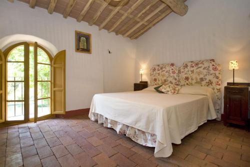 Ліжко або ліжка в номері Villa Bottino