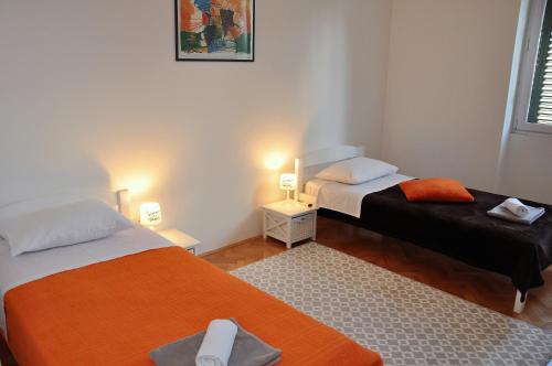 Posteľ alebo postele v izbe v ubytovaní Marta Sea Residence