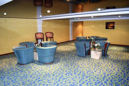 Χώρος καθιστικού στο Hotel Le Pole Europeen
