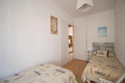 Posteľ alebo postele v izbe v ubytovaní San Remo Iberplaya