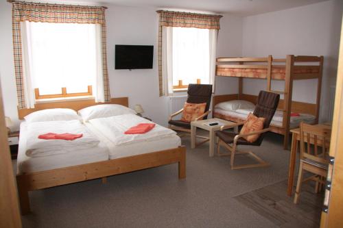 Poschodová posteľ alebo postele v izbe v ubytovaní OK-35