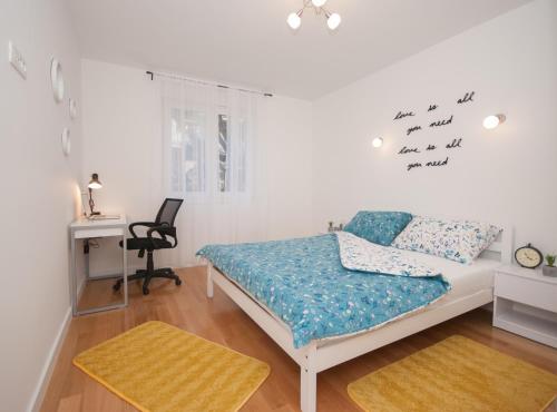 Posteľ alebo postele v izbe v ubytovaní Apartment Mia