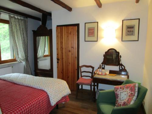 Ένα ή περισσότερα κρεβάτια σε δωμάτιο στο Podere La Piana