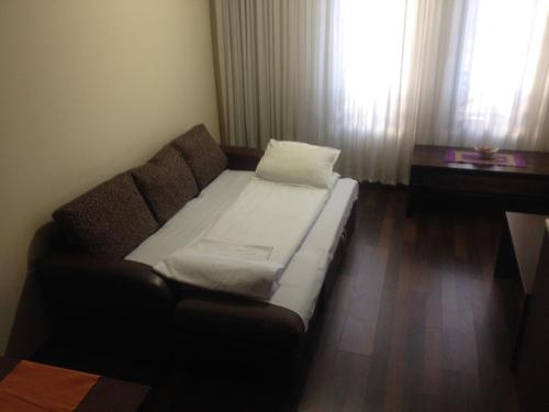 Cama o camas de una habitación en Ski Lift Apartment in Bansko