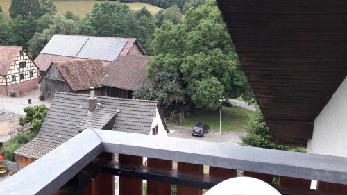 a view from a balcony of a village with houses at Ferienwohnung Gareus in Zittenfelden