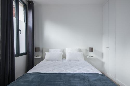 Кровать или кровати в номере L'Industriel, loft de 2 chambres, Villa Saint Charles