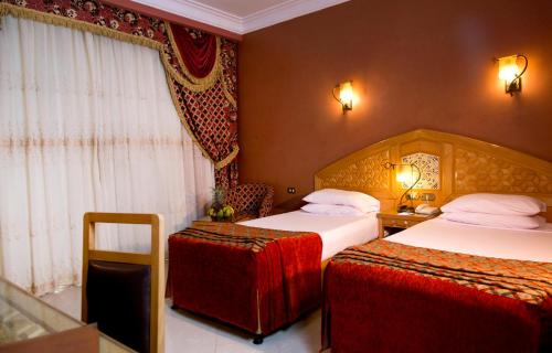 Кровать или кровати в номере Oriental Rivoli Hotel & Spa