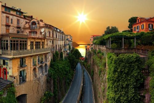 a view of a road on a hill with buildings at Residenza Sorrentina in Sorrento