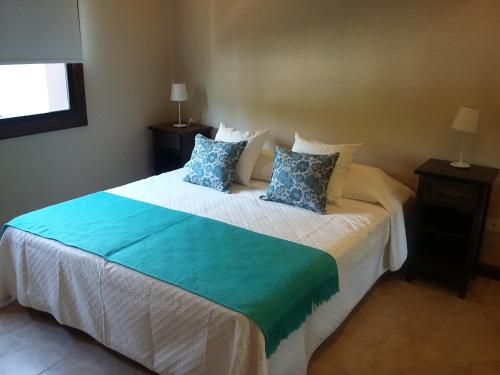 Katil atau katil-katil dalam bilik di Aparts Calafate Suites