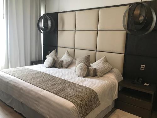 Cama o camas de una habitación en Huper Hotel Boutique