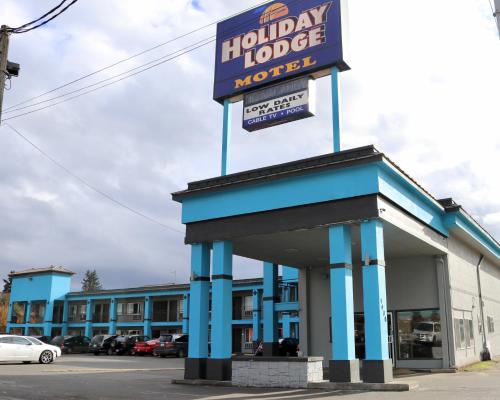 a hollyridge motel sign on top of a building at Holiday Lodge - Salem,OR in Salem