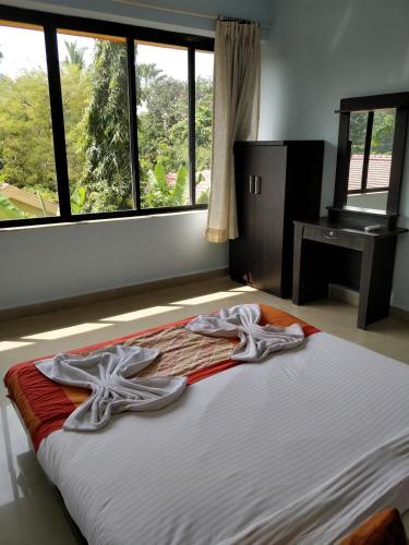 Katil atau katil-katil dalam bilik di YoYo Goa, The Apartment Hotel