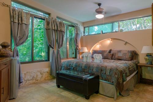 Postel nebo postele na pokoji v ubytování Hacienda Xcaret