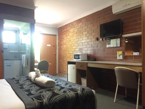Kuchyň nebo kuchyňský kout v ubytování Pooraka Motor Inn