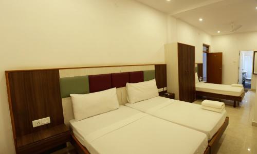 Posteľ alebo postele v izbe v ubytovaní Vilasam