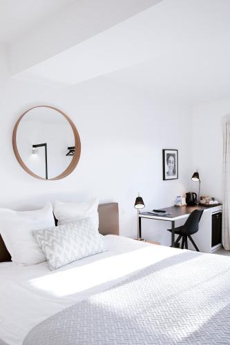 Una cama o camas en una habitación de Hoeve La Cascina