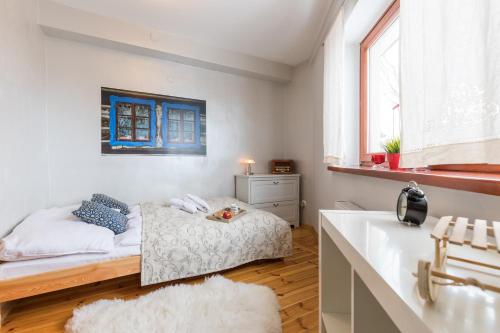 Posteľ alebo postele v izbe v ubytovaní Apartament Marmurki Zakopane