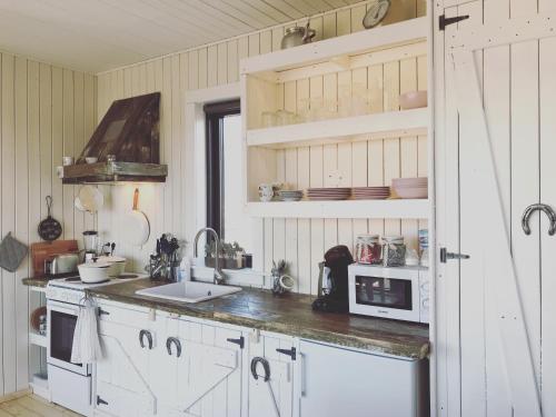 Majoituspaikan Akurgerði Guesthouse 8 - Country Life Style keittiö tai keittotila