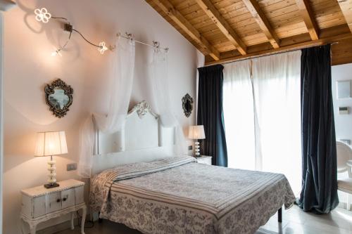 Säng eller sängar i ett rum på Agriturismo Ca' Del Sol