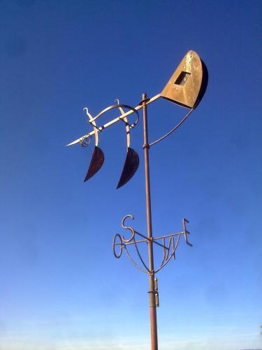 a street light with two birds on top of it at Ad Hoc Parque in Bétera