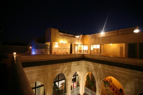 a view of a building at night at Riad et Spa Misria Les Orangers in Marrakech