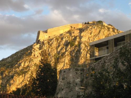 a building on the side of a mountain at Amfitriti Palazzo in Nafplio