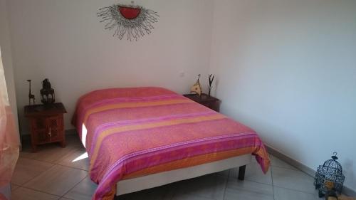 Rúm í herbergi á Appartement Molini