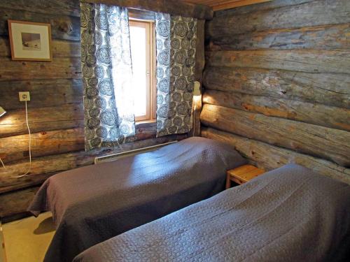 Una cama o camas en una habitación de Polar Star Villa Kelo