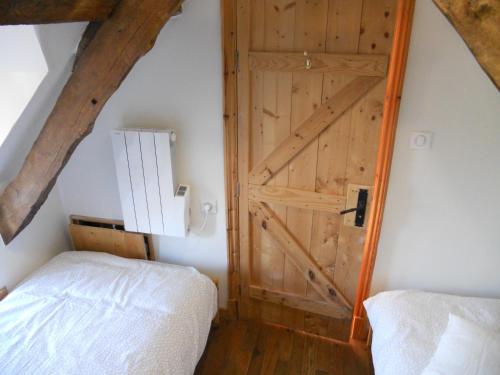 Cama o camas de una habitación en Gîtes de Botplançon