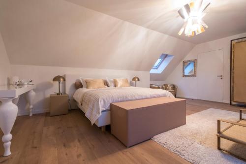 Postel nebo postele na pokoji v ubytování B&B La Douceur de la Miclette