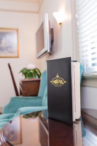 a book sitting on top of a glass table at Columbia Gorge Hotel & Spa in Hood River