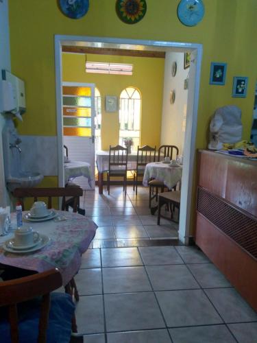 En eller flere senge i et værelse på Pousada Venezia