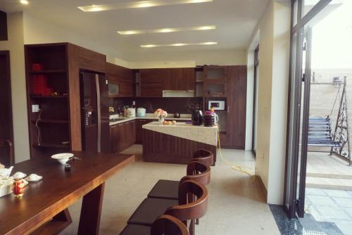 Dapur atau dapur kecil di Homestay Villa Full House