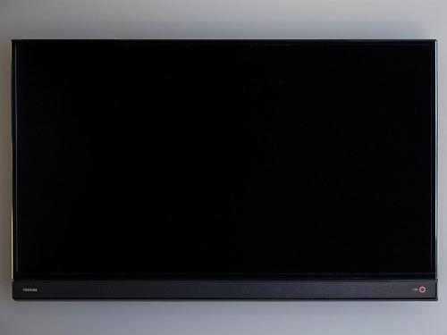 a flat screen computer monitor sitting on a table at Hearton Hotel Shinsaibashi Nagahoridouri in Osaka