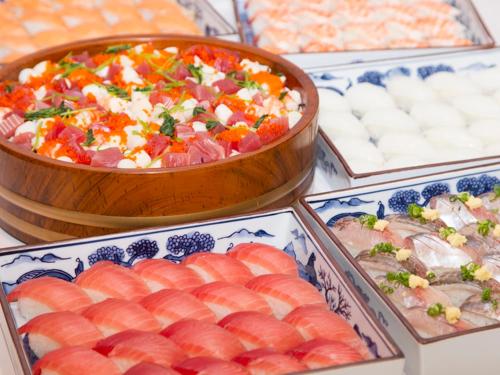 a buffet of different types of food on a table at Itoen Hotel Toi in Izu
