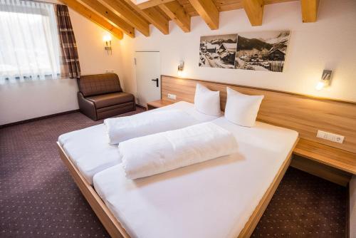 Postel nebo postele na pokoji v ubytování Appartements Platzl