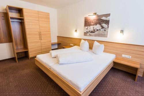 Postel nebo postele na pokoji v ubytování Appartements Platzl