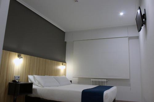 Cama o camas de una habitación en Hotel Altiana