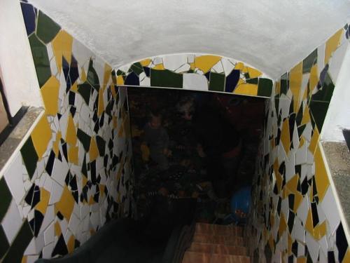 a hallway with a room with colorful tiles on the wall at Eselgut Pühringer in Hofkirchen im Mühlkreise