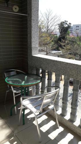 Rõdu või terrass majutusasutuses Fengming B&B