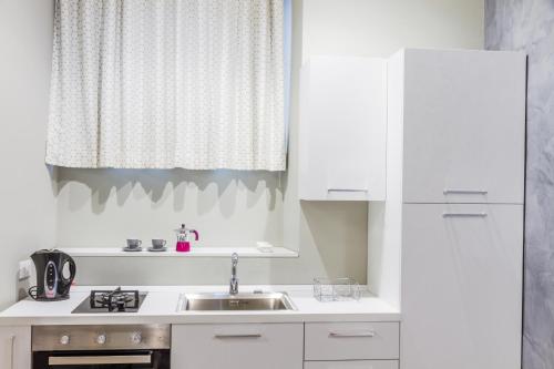 O bucătărie sau chicinetă la Suite Bordonaro Apartments